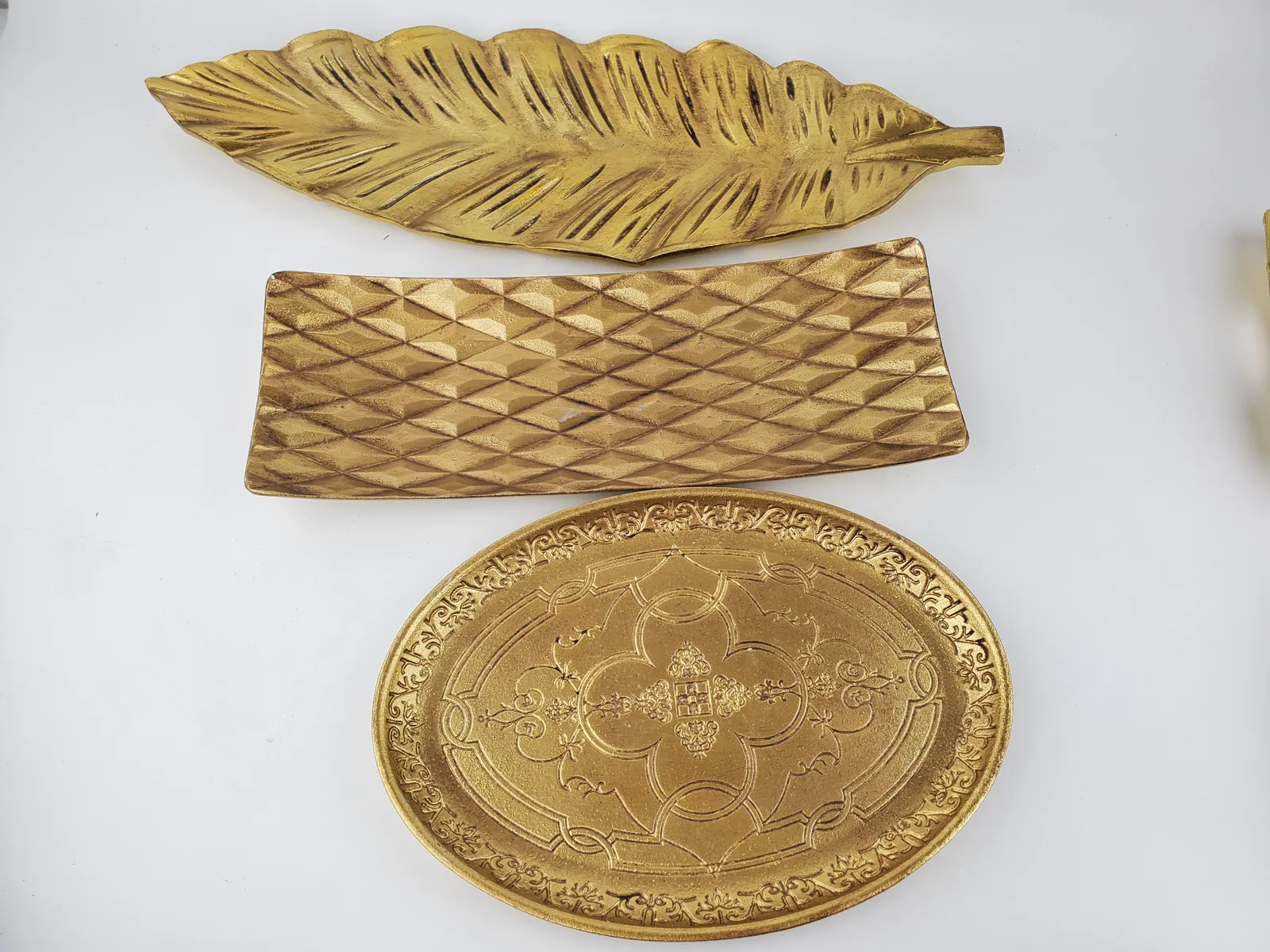 Gold decorative serving tray assortment