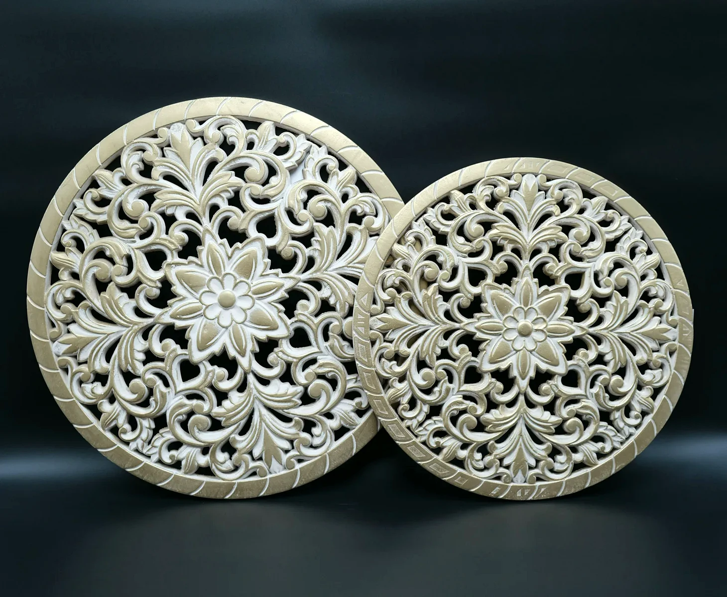 Carved decorative wall medallion pair