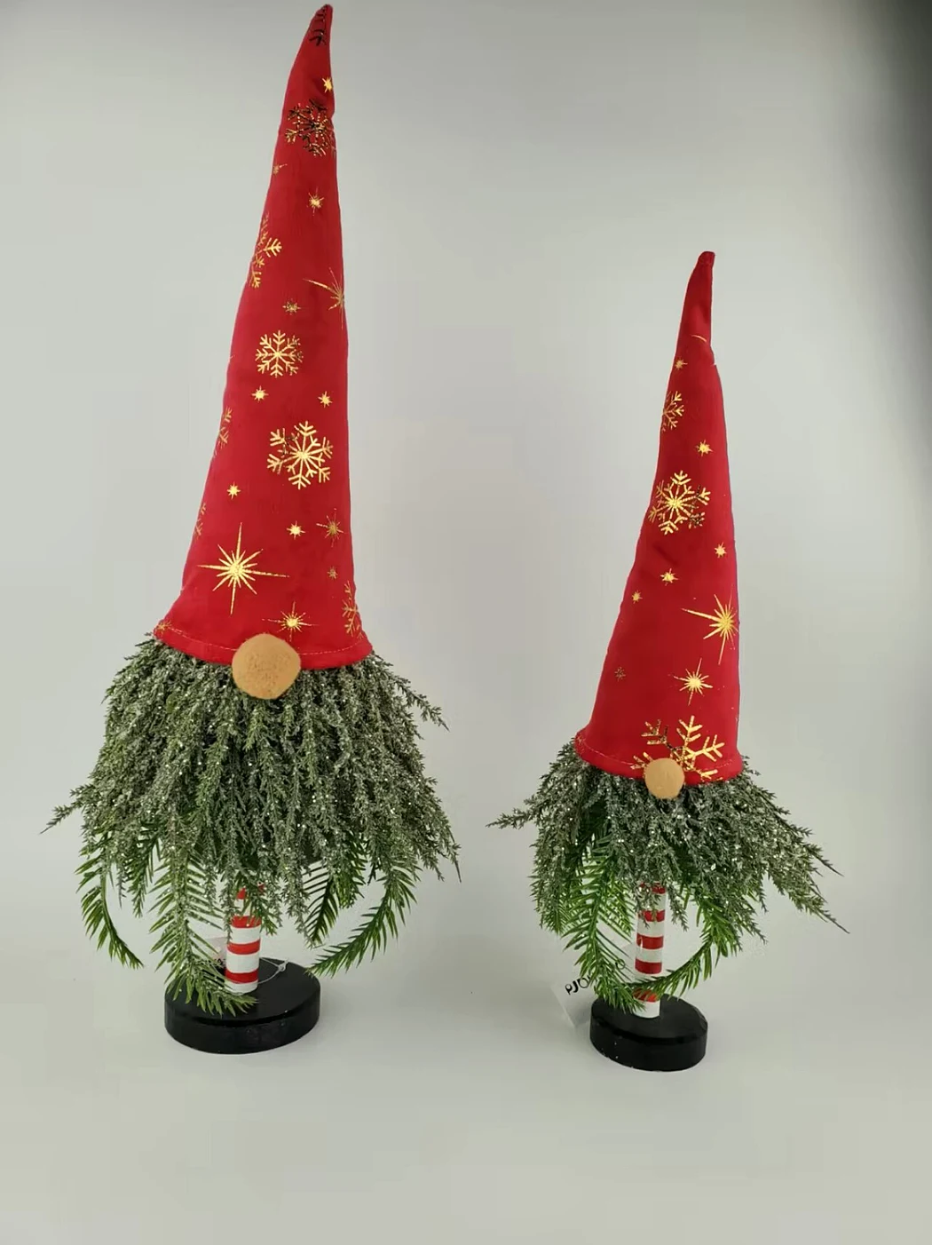 Pair of red Christmas gnome trees